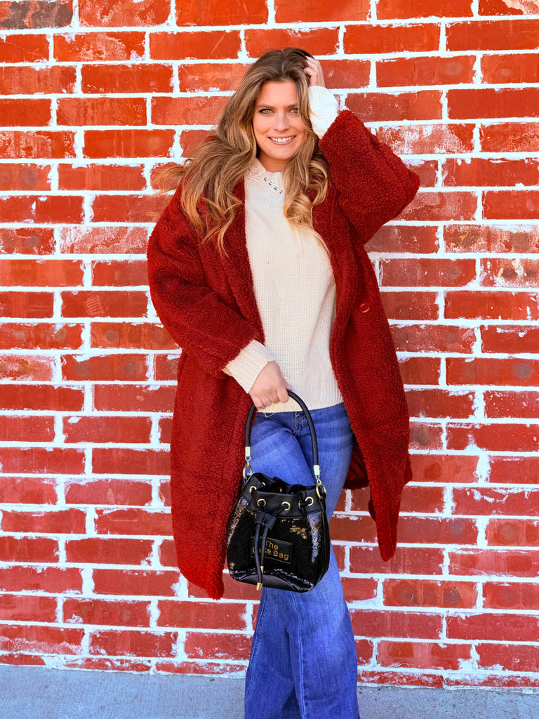 Crimson Kisses Stepping into Luxe Sherpa Long Fur Jacket