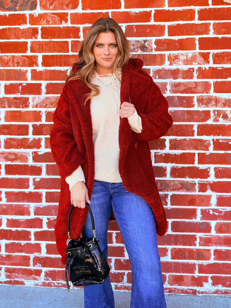 Crimson Kisses Stepping into Luxe Sherpa Long Fur Jacket